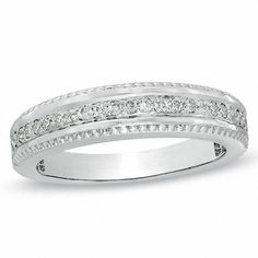 a white gold wedding band with diamonds