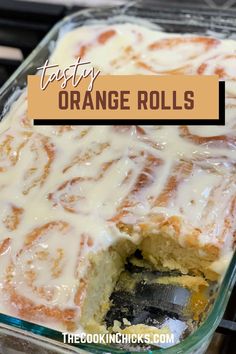 an orange roll in a glass baking dish