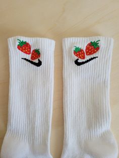 Strawberry socks with two Strawberries adjacent from each other. These cute socks are trendy with medium size bright red strawberries with yellow speckles. The strawberry embroidery is cute design that makes a pop of color statement. Imagine a strawberry field on top of your crew socks, spring/summer vibes whenever you wear a pair.  SIZE M (6-10 WOMEN, 6-8 MEN) L ( 10-13 WOMEN, 9-12 MEN) The design is embroidered on the outer side of each sock. NOT on both sides of 1 sock. If you want it on both Strawberry Socks, Strawberry Embroidery, Aesthetic Socks, Strawberry Field, Pretty Socks, Embroidery Cute, Trendy Embroidery, Embroidered Socks, Trendy Socks