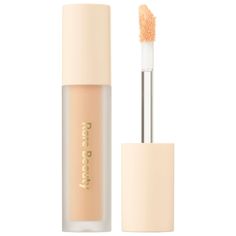 What it is: A weightless, hydrating eye primer that smooths lids while prepping for longer-lasting, amped-up color that won't crease, fade, or smudge.Ingredient Callouts: Free of parabens, formaldehydes, formaldehyde-releasing agents, phthalates, mineral oil, retinyl palmitate. It is also cruelty-free.What Else You Need to Know: With instant hydration that lasts all day, this creamy primer dries quickly to a seamless, silky-smooth base perfect for eyeshadow application. The peach-tinted formula Rare Beauty Eye Primer, Best Eyeshadow Primer, Best Eye Primer, Casa Aesthetic, Eyeshadow Application, Shein Clothes, Rare Beauty By Selena Gomez, Eye Makeup Pictures, Best Eyeshadow