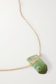 JIA JIA's one of a kind necklace is strung with a beautiful, untreated green tourmaline - a stone believed to bring virility and strength to the wearer. It's handmade from 14-karat gold and features a slim band pavéd with shimmering diamonds. The 20'' chain is adjustable, so you can customize the length. Yellow Gold Tourmaline Jewelry For May Birthstone, Green Tourmaline Pendant Jewelry, Green Tourmaline Necklace In Fine Jewelry Style, Tourmaline Jewelry With Gemstone Accents, Green Tourmaline Gemstone Jewelry, Green Tourmaline Gemstone Necklace, Fine Jewelry Tourmaline May Birthstone, Yellow Gold Tourmaline Gemstone Necklace, Elegant Green Tourmaline Necklaces