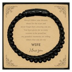 a black beaded bracelet with the words wife on it and an inscription that says i love you