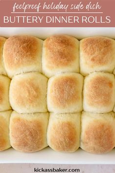 a white dish filled with buttery dinner rolls