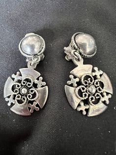 Vintage Sterling Silver Jerusalem Cross Dangle Drop Earrings. Signed on back. Some toning from age. Measures approx 1 1/2" X 3/4" Weight is approx 10 grams Vintage Sterling Silver Drop Clip-on Earrings, Ornate Clip-on Drop Earrings, Antique Silver Drop Clip-on Earrings, Antique Silver Dangle Clip-on Earrings, Unique Silver Clip-on Earrings, Formal Clip-on Dangle Plug Earrings, Vintage Silver Clip-on Plug Earrings, Classy Jewelry, Oct 30