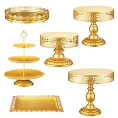 golden cake stands and trays on white background