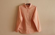 "Women's Shirt Plaid Shirt Vintage Womens Shirt White Pink Plaid Shirt Cotton Womens Blouse Long Sleeve Shirt Large Size Measurements (lying flat): Length: 26.5\"/ 67 cm Pit to pit: 23\"/ 58.5 cm Sleeve: 24\"/ 61 cm Shoulders: 15.5\"/ 39.5 cm Please check measurements to insure a proper fit. Remember to allow yourself some extra room for movement. You can compare these with something from your closet that fits you well. Please convo me if you need additional measurements. Condition: Great Vintag Plaid Cotton Button-up Blouse, Orange Long Sleeve Cotton Blouse, Orange Cotton Blouse For Work, Plaid Cotton Collared Blouse, Plaid Long Sleeve Shirt For Daywear, Orange Button-up Cotton Blouse, Orange Cotton Button-up Blouse, Casual Orange Cotton Blouse, Casual Cotton Blouse With Spread Collar