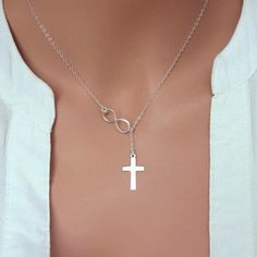 "Sterling Silver Infinity Cross Necklace All metal components onto sterling silver . The necklace make of .. -Sterling Silver Infinity Charm, -Solid Sterling Silver 2.9x21.8mm 21ga Cross and Sterling silver cable chain with spring claw . -Total length will be 16\" 17\" 18\" or 19\" depend on customer request. -Come up with beautiful ribbon gift box -One set of care instruction package that enhance your present ... -All quantities are available please contact us for different number of quantities Sterling Silver Clavicle Chain Jewelry With Cross Pendant, Mother's Day Alloy Clavicle Chain Jewelry, Gift Silver Chain Jewelry With Cross Pendant, Silver Cross Jewelry With Adjustable Chain, Silver Clavicle Chain Jewelry With Cross Pendant, Silver Chain Cross Pendant Jewelry Gift, Silver Chain Cross Jewelry Gift, Silver Chain Jewelry With Cross Pendant For Gift, Silver Necklace With Adjustable Chain As Gift For Her