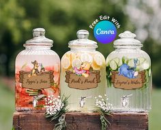 three glass jars with winnie the pooh labels on them sitting on a wooden box