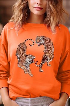 Tigers Graphic Fleece Sweatshirts.Unisex Crew Neck Long Sleeve Sweaters Knits.Crafted from premium materials, tailored to your lifestyle, ensuring a comfortable fit for any occasion.Family Group Uniforms Birthday Party Gift Concert Festival Events.High Quality Direct To Film Printed Graphic Design.50%COTTON,50%POLYESTERNICARAGUAMade In: Nicaragua Orange Long Sleeve Tops With Ribbed Cuffs, Orange Long Sleeve Top With Ribbed Cuffs, Orange Crew Neck Sweatshirt For Loungewear, Orange Crew Neck Sweater With Ribbed Cuffs, Orange Ribbed Cuff Crew Neck Sweater, Casual Orange Crew Neck Sweater, Orange Crew Neck Top For Winter, Stretch Crew Neck Sweatshirt For Leisure, Orange Relaxed Fit Long Sleeve Sweatshirt