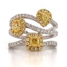 Fancy Yellow Three Shape Diamond 1.43carat Ring.Metal: 18Kt White & Yellow GoldFancy yellow Oval, Cushion, Pear shape Diamonds: 3 Fancy Yellow 0.86ct t.w.Brilliant Round Cut: 49 Round Brilliant cuts 0.57ct t.w.Width: 18mm Estimated production time is 4 - 5 weeks Pear Shaped Diamond, Ring Metal, Pear Shape, Pear Shaped, Round Brilliant, Yellow White, Round Cut, Diamond Ring, Pear