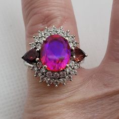 Volcanic Quartz ,Garnet And Multi Gemstone Ring In Platinum Over Sterling Silver 5.20 Ctw . The Colors Of This Unique And Rare Authentic Volcanic Quartz Ring Are A Mesmerizing Hue Of Pink An Purple Opalescense Very Pleasing To The Eye. This Ring Has Tons Of Fire! Perfect For Anniversary, Promise, Engagement, Birthday Or Just For Gifting Yourself! Make Me An Offer! Other Listings Womens Rings 925 Sterling Silver Gold Rose Gold Platinum Authentic Genuine Gemstones Gemstone Anniversary Promise Enga Gemstone Accents Cluster Ring Gift, Silver Oval Multi-stone Gemstones, Oval Silver Multi-stone Gemstones, Oval Multi-stone Silver Gemstones, Classic Silver Cluster Ring With Multi-stone, Classic Silver Amethyst Ring With Multi-stone, Silver Multi-stone Ruby Ring For Anniversary, Luxury Silver Cluster Ring With Multi-stone, Silver Multi-stone Cluster Ring For Formal Occasions