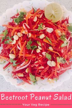 a white plate topped with carrots and radishes next to a lemon wedge