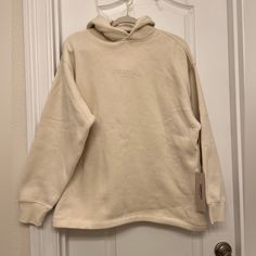 Brand New!! Essentials Fear Of God Men’s Relaxed Fit Hoodie Size Xxs Color Eggshell Brand New Received As Gift In Original Packaging Selling Since Too Small For My Liking I Am Open To Reasonable Offers!! Would Fit Really Good On Like A 10 Year Old! Casual Cream Hoodie With Ribbed Cuffs, Cream Hoodie With Double-lined Hood For Streetwear, Cream Hoodie With Adjustable Hood For Streetwear, Streetwear Cream Hoodie With Adjustable Hood, Cream Sweatshirt With Drawstring Hood For Streetwear, Cream Sweatshirt With Double-lined Hood For Streetwear, Cream Drawstring Hood Sweatshirt For Streetwear, Casual Cream Hoodie With Adjustable Hood, Winter White Hoodie With Double-lined Hood