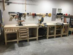 two workbenches in a garage with tools on the table and other woodworking equipment