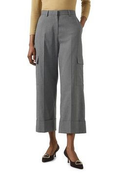 A relaxed take on the utility trend, these cropped pants feature a pinstrope pattern and roomy cargo pockets. Zip fly with button closure Front slant pockets; back flap-patch pockets; cargo flap-patch pockets 65% polyester, 33% viscose, 2% elastane Machine wash, dry flat Imported Spring Workwear Cargo Pants With Patch Pockets, Workwear Bottoms With Multiple Pockets For Spring, Spring Workwear Bottoms With Multiple Pockets, Cropped Leg Cargo Pants With Patch Pockets For Work, Bottoms With Multiple Pockets For Work, Spring, Cropped Cargo Style Workwear Bottoms, Cropped Cargo Bottoms For Workwear, Pinstripe Wide Leg Pants With Pockets, Utility Cargo Pants With Cropped Leg And Welt Pockets