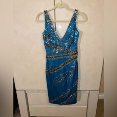 Like New, No Signs Of Wear Purchased From La Gorgeous Satin Material Different Kinds Of Embellishments Like Grey Pearls And Sequins And Rhinestones Evening Dresses For Weddings, Different Kinds, Satin Material, Pearl Grey, Embellished Dress, Embellishments, Evening Dresses, Colorful Dresses, Color Blue