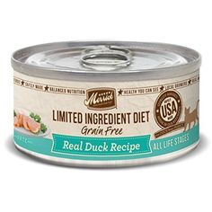 an open can of canned cat food with salmon on it's bottom and the lid