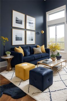 a living room with blue walls and yellow accents on the couch, coffee table and ottoman