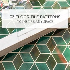 the floor tiles in this bathroom are green and white with hexagonal designs on them