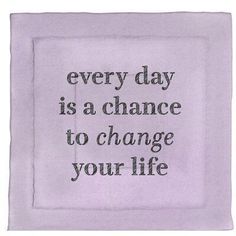 a white towel with the words every day is a chance to change your life