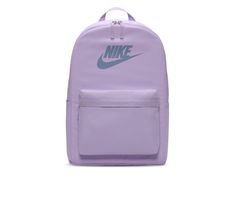 Show off your athletic style with the Nike® Heritage Backpack this year. This classic style backpack has a large main compartment with laptop pocket, and additional side pockets for added storage. The iconic Nike® branding details will make you a standout in the hallway just like you're a standout on the court! Synthetic upper, Adjustable padded shoulder straps,18 inches H x 11 inches W x 5 inches D, Padded back, Large zippered compartment with laptop pocket, Two side zip pockets, Front zip pocket, Top loop handle, Nike® branding elements | Nike Heritage Backpack in Lilac Bloom Nike Casual Bags For Students, Nike Sporty Backpack For Daily Use, Casual Nike Bags For Students, Nike Backpack For Students, Nike Standard Backpack For Students, Nike Gym Backpack, Casual Backpack With Logo For Daily Use, Casual Campus Bags For Back To School, Casual Back To School Campus Bag