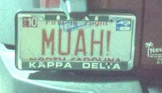 a license plate on the back of a car that says muah kapa delia