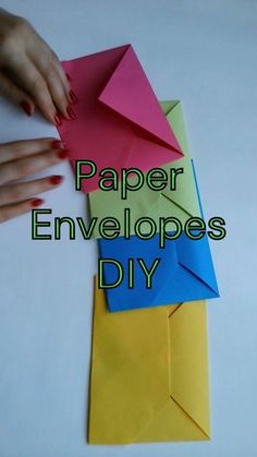 paper envelopes are used to make an origami bird craft for kids and adults