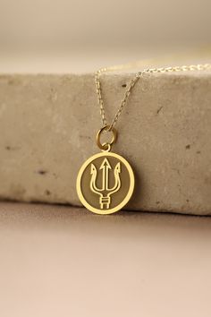 Gold Trident Pendant - Trident Gold Necklace ● Material of pendant: Solid Gold 14k ( REAL GOLD ) ● Metal Stamp: 14k ( REAL GOLD ) ● The pendant is available in 5 sizes: - 12,7 mm / 0.5 inches (Diameter) - 14,0 mm / 0,55 inches ( Diameter ) In the photos - 15,3 mm / 0.6 inches ( Diameter ) - 16,5 mm / 0,65 inches ( Diameter ) - 19,1 mm / 0,75 inches ( Diameter ) ( In the photos the size is 14mm / 0.55 inches Diameter ) ( Jump Ring inner diameter: 4 mm ) ● Material of chain: Solid gold 14k ( REAL Poseidon Necklace, Percy Jackson Jewelry, Trident Pendant, Trident Necklace, Poseidon Trident, Daughter Of Poseidon, Percy Jackson Cast, Percy Jackson Books, Funky Jewelry