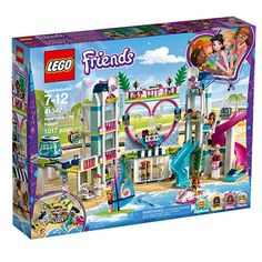 the lego friends amusement park playset is packed with toys and accessories, including a water slide