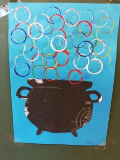 this is an art project for kids to do with the colors of the olympic rings