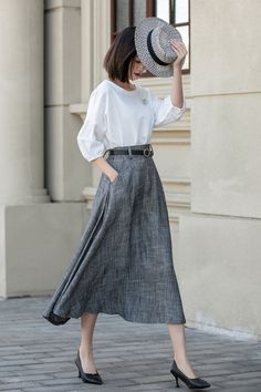 Elegant Flow - The Charcoal Pleated Skirt 4899 Elegant Long Gray Skirt, Elegant Gray Flowy Skirt, Gray Relaxed Fit Lined Maxi Skirt, Gray Relaxed Maxi Skirt With Lined Skirt, Gray Relaxed Maxi Skirt With Lining, Gray Relaxed Fit Maxi Skirt With Lining, Formal Linen Skirt For Spring, Formal Spring Linen Skirt, Gray Flared Maxi Skirt With Lined Skirt