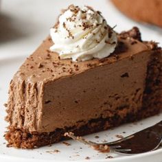 a slice of chocolate pie with whipped cream on top