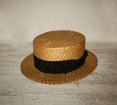 Incredibly elegant antique straw skimmer/boater hat from the 1920s. Made by Stockport England.  Truly amazing and rare condition for a straw hat of its age.  Measures approximately 53cm. around the inside edge. 270 grams before packing For any information do not hesitate to contact me, I will be happy to answer you Trendy Hat, Boater Hat, Summer Hat, Skull Cap Beanie, Skull Cap, Summer Hats, Straw Hat, Gift For Him, Caps Hats