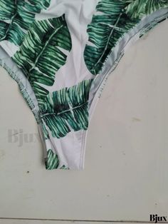 Bjux - Womens Leaf Print One Piece Swimsuit with Halter Neck, Tummy Control, and High Cut - Stylish Swimwear and Clothing Tropical Green Bodysuit For Vacation, Green Printed Beach Bodysuit, Green Printed Bodysuit For The Beach, Green Printed One-piece For Vacation, Summer Printed Green Bodysuit, Printed Green Summer Bodysuit, Summer Green Printed Bodysuit, Green Printed Summer One Piece, Summer Green Printed One-pieces