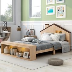 a bedroom with a bed, bookshelf and pictures on the wall above it