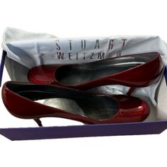 Beautiful Ruby Red Patent Leather Heels By Stuart Weitzman. Wizard Of Oz Vibes Genuine Leather Made In Spain Heel Measures 3” Size 9.5 N Like New Condition! Stuart Weitzman Purple Box (Other Type Of Shoe, Not Original), Tissue And Dustbag Included. Elegant Fitted Red Court Shoes, Designer Red Heels For Work, Formal Court Shoes With Red Sole, Red Patent Leather Court Shoes For Formal Occasions, Red Court Shoes With 4-inch Heel For Formal Occasions, Elegant Red Almond Toe Court Shoes, Elegant Red Heels For Office, Elegant Red Office Heels, Red Formal Court Shoes With Padded Heel