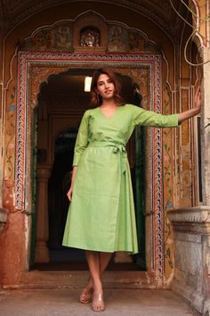 🌸  VIENNA Vienna is a beautiful classical wrap style dress in fresh green. Hand made from hand loom cotton fabric from India. This dress has a fully lined front and unlined skirt. Sizings: Size S: Shoulders 36cm - 14,1"    Bust 94cm - 37"  Waist 86cm - 33.8"  Length approx. 114cm - 44.8" Size M:   Shoulders 39cm - 15,3"  Bust 100cm - 39,3" Waist 94cm - 37"  Length approx. 114cm - 44.8" Size L: Shoulders 40cm - 15.7"  Bust 106cm - 41.7" Waist 98cm - 38.5"  Length approx. 114cm - 44.8" Size XL: S Traditional Green V-neck Dress, Green Traditional V-neck Dress, Green Bohemian V-neck Wrap Dress, Green Spring Wrap Dress With Surplice Neckline, Green Surplice Neckline Wrap Dress For Spring, Green Knee-length Wrap Dress For Spring, Casual Green Wrap Dress, Green Summer Wrap Dress, Green Wrap Dress For Spring