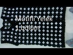 a black and white crocheted afghan with the words mottfi yelk 1 bo