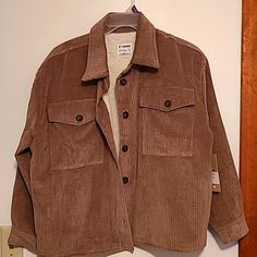 Nwot Cisono Taupe Color Corduroy Button Up Jacket With Sherpa Lining Sz L Button Front & Cuffs. Soft Taupe Corduroy With Sherpa Lining. Button Cuff Sleeves, 2 Front Glap Pockets. Has Extra Button. Great Look With Jeans Has Some Stretch. Pit To Pit 27 Inches Length 25 Inches 24/9 Winter Workwear Shacket With Corduroy Collar, Corduroy Outerwear With Snap Buttons For Winter, Trendy Corduroy Outerwear With Button Closure, Corduroy Button-up Outerwear For Work, Corduroy Outerwear With Button Closure And Long Sleeves, Winter Corduroy Outerwear With Buttons, Corduroy Winter Outerwear With Buttons, Collared Corduroy Shacket With Buttons, Fall Outerwear With Corduroy Collar Button-up