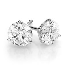 From the IDC Ideal Studs Collection, these classic solitaire diamond earrings are set in a platinum martini 3-prong basket. They are perfect for all occasions, lightweight and ideally suited for anyone who loves an elegant style that is timeless and effortless to mix and match. Two matching hand-selected round brilliant cut diamonds are nestled in a three-prong setting basket totaling 1/3 carat together. Color Range: G-I Clarity Range: SI2 Martini Earrings, Diamond Solitaire Earrings, White Gold Diamond Earrings, Diamond Earrings Studs Round, Gold Diamond Earrings Studs, White Gold Solitaire, Gold Diamond Earrings, Stud Set, 3 Carat