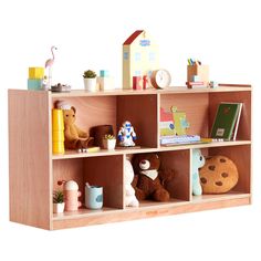 a wooden shelf filled with lots of toys