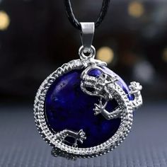 Natural Stone Dragon Pendant Healing Gemstone Necklace. Color / Texture / Shades May Slightly Vary As Each Pendant Is One Of A Kind Due To The Natural Variations In The Stones, Making Them A Special And Personalized Accessory. Size: 1.18" Stock Id: Tja59-17-Z230 Blue Dragon Necklace, Blue Crystal Pendant Necklace With Adjustable Chain, Silver Lapis Lazuli Round Pendant Jewelry, Blue Lapis Lazuli Round Necklace, Blue Crystal Necklaces For Jewelry Making, Blue Metal Crystal Necklaces For Jewelry Making, Blue Crystal Round Pendant Necklace For Gift, Blue Round Pendant Crystal Necklace For Gift, Blue Crystal Necklace With Round Pendant For Gift