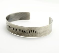 "Oxidized Sterling Silver Personalized 1/2 in wide Cuff Bracelet, Double Sided, Gift for Man, Anniversary, Father's Day Hidden Message, Wedding, Keepsake This beautiful cuff with rustic finish makes a perfect gift for both men and women. It is hand stamped with the text of your choice - I can be names, phrase, song lyrics. It can be stamped on the inside or outside of the bracelet up to 60 characters on either side. If you need a longer quote please contact me for pricing. Pictured cuff has a ox Rustic Silver Bracelets For Gifts, Rustic Silver Bracelet For Gift, Rustic Stamped Cuff Bracelet Gift, Rustic Stamped Bracelets For Gifts, Rustic Stamped Bracelets For Gift, Rustic Bangle Cuff Bracelet As Gift, Personalized Cuff Bracelets, Custom Jewelry Box, Christmas Gift For Him