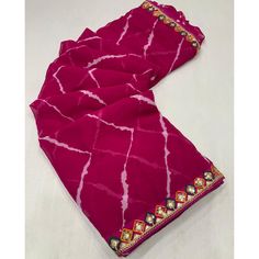 Pink colored saree is made from georgette fabric which is highlighted with beautiful printed with sequince embroidered lace border work as shown. comes along unstitched banglori silk blouse piece which you can customise as per your design/style. Occasion - You can wear this saree for casual and daily and ideal for any fashionista. Note:- The actual product may differ slightly in color and design from the one illustrated in the images when compared with computer or mobile screen. Measurements: Sa Multicolor Anarkali Style Georgette Saree, Anarkali Multicolor Georgette Saree, Semi-stitched Multicolor Pre-draped Saree In Chinon, Festival Georgette Pre-draped Saree With Printed Border, Festival Georgette Pre-draped Saree With Border, Festive Georgette Blouse Piece With Border, Unstitched Georgette Traditional Wear With Border, Unstitched Georgette Saree With Border, Festive Georgette Pre-draped Saree With Border