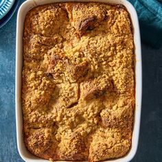 a casserole dish filled with meat and bread crumbs on a table