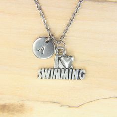 ♥ Swimming Necklace Silver I Love Swimming Charm Necklace Sport Gift Swimming Charms Swimming Gift Initial Necklace ♥ This is a beautiful I Love Swimming charm with hand stamped initial charm on a stainless steel chain, You able to choose initial from a drop down menu, ♥ You will receive 1 necklace ♥ I Love Swimming charm 15x22x2 mm ♥ Initial charm 10 mm choose from a drop down menu ♥ Stainless steel chain 18 inches ♥ additional initial https://www.etsy.com/listing/766732811 If you need help wit Metal Letter Jewelry For Gift, Metal Letter-shaped Jewelry For Gifts, Letter-shaped Metal Jewelry For Gifts, Metal Letter-shaped Jewelry As Gift, Silver Letter Charm Necklace For Birthday, Silver Letter Charm Necklace For Birthday Gift, Silver Stamped Charm Necklaces For Valentine's Day, Silver Stamped Charm Necklace For Valentine's Day, Valentine's Day Silver Stamped Charm Necklaces