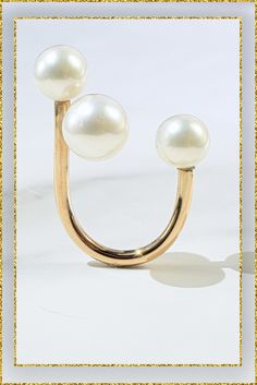 Make a statement with our gold pearl floating illusion ring! Crafted with care, this ring features three pearls that appear to float effortlessly on your finger. Add a touch of glamour to your look—shop now! Refined Open Ring Jewelry For Wedding, Fine Jewelry Ring With Timeless Design, Timeless Fine Jewelry Ring, Elegant Everyday Luxury Ring Jewelry, Fine Jewelry In White With Timeless Design, White Fine Jewelry With Timeless Design, Luxury Pearl Open Ring With Polished Finish, Luxury Open Pearl Ring With Polished Finish, Luxury 14k Gold Pearl Ring