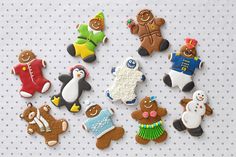 there are many decorated cookies on the table