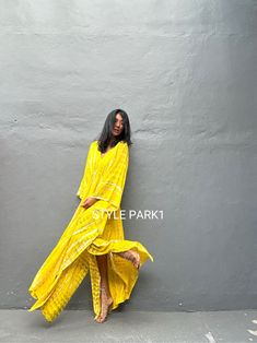 Uluwatu Kaftan dress" Soft, Smooth, Lightweight Rayon voile Fabric. Perfect for Elegant Day and Nightwear or worn as a cover-up for that beach or poolside statement of glamour. And for Muslim women   Color - Bali  Tie Dyed Lemon yellow & multi motif Measurements in CM and Inches.  Size American measurement is Medium to Large.  It fits all the body sizes between M to2XL Size - One size fits all American size From M to 2XL Total wide /240cm/94inch(round) Chest & him /180cm/70inch(round) The length /140cm/55inch We recommend all types of ladies you can surly accessorize with it to create your glamorous looks.  👉Please choose carefully Color & Size 👈  Iphone 14Photos therefore, the color can be slightly different between the real products and photos. Free Size Boho Maxi Dress For Beach Cover-up, Flowy Long Kaftan For Summer, Flowy Floor-length Summer Kaftan, Flowy Tunic Boho Dress For Beach Season, Flowy Long Hippie Cover-up, Yellow Flowy Dress For Beach Cover-up, Yellow Boho Dress For Summer Vacation, Floor-length Flowy Kaftan For The Beach, Flowy Summer Maxi Kaftan