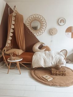 a bedroom with a bed, chair and mirror on the wall next to each other